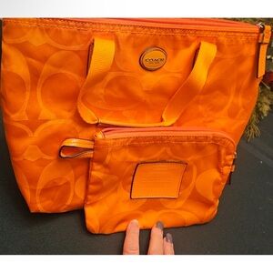 Coach Signature Bag with Cosmetic Pouch
Coach